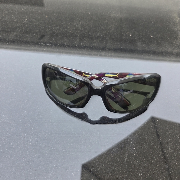 Women’s Maui Jim Black Frame Sunglasses with Gray Lenses.